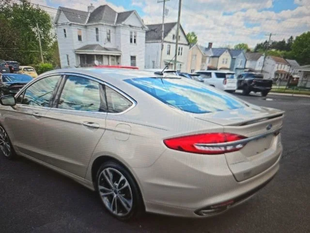 Used 2017 Ford Fusion Titanium with VIN 3FA6P0D92HR213208 for sale in Beachwood, OH