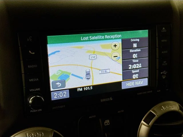 Used 2018 White Jeep Unlimited Sahara image 14