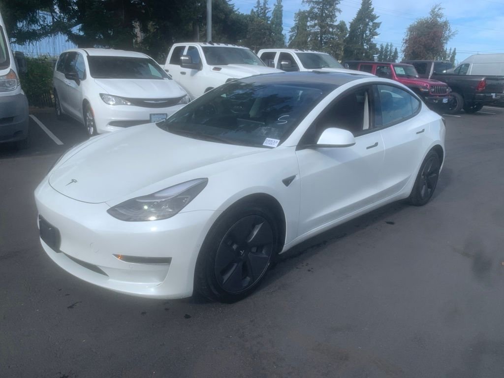 Used 2021 White Tesla Standard Range Plus image 1