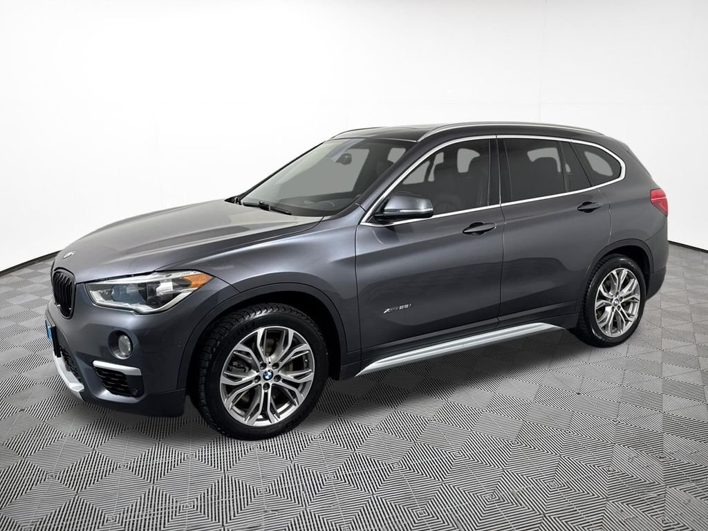 Used 2017 BMW X1 28i with VIN WBXHT3Z34H4A56784 for sale in Chippewa Falls, WI