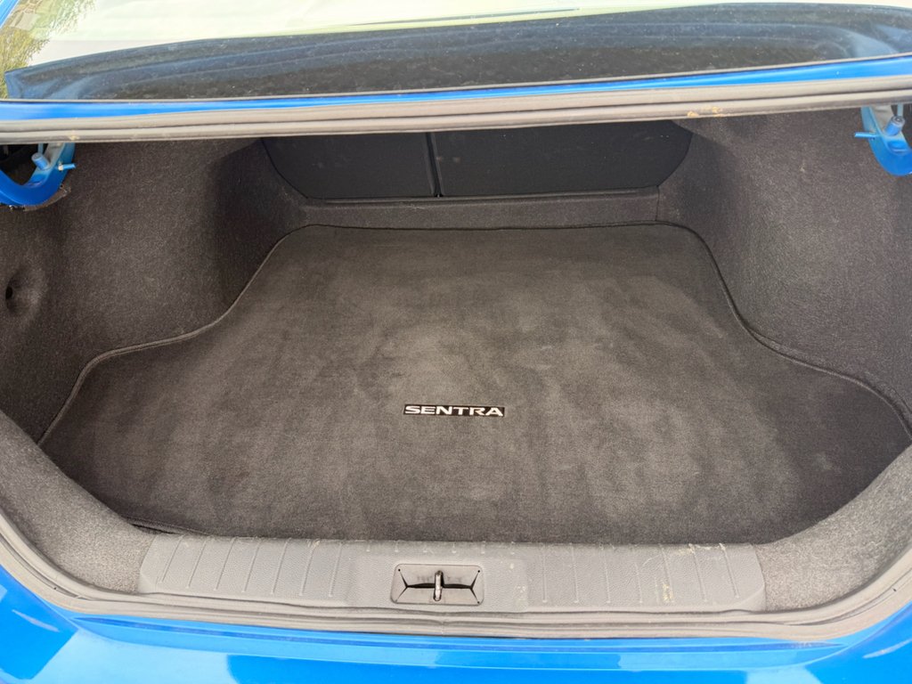 Used 2024 Electric Blue Metallic Nissan SV image 9