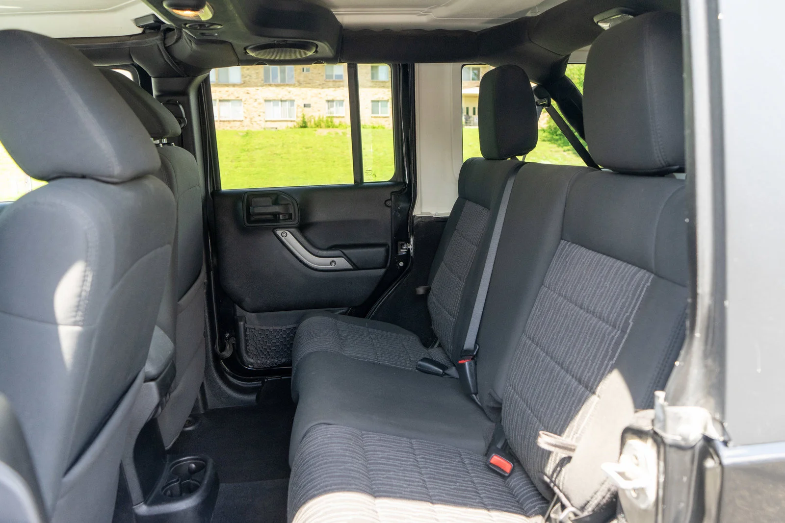 Used 2012 Black Clearcoat Jeep Unlimited Sport image 24