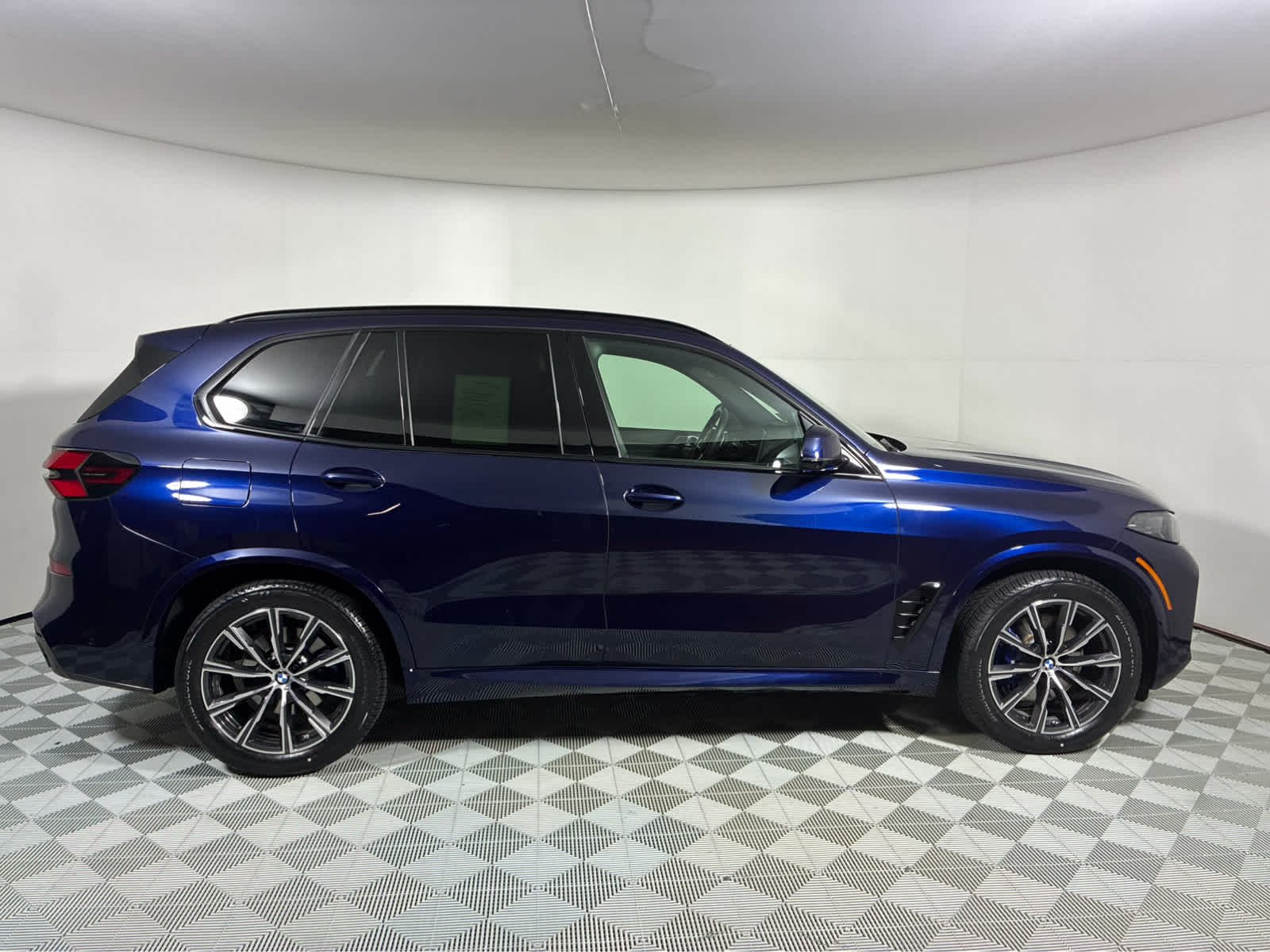 Used 2026 Tanzanite Blue II Metallic BMW xDrive40i image 4
