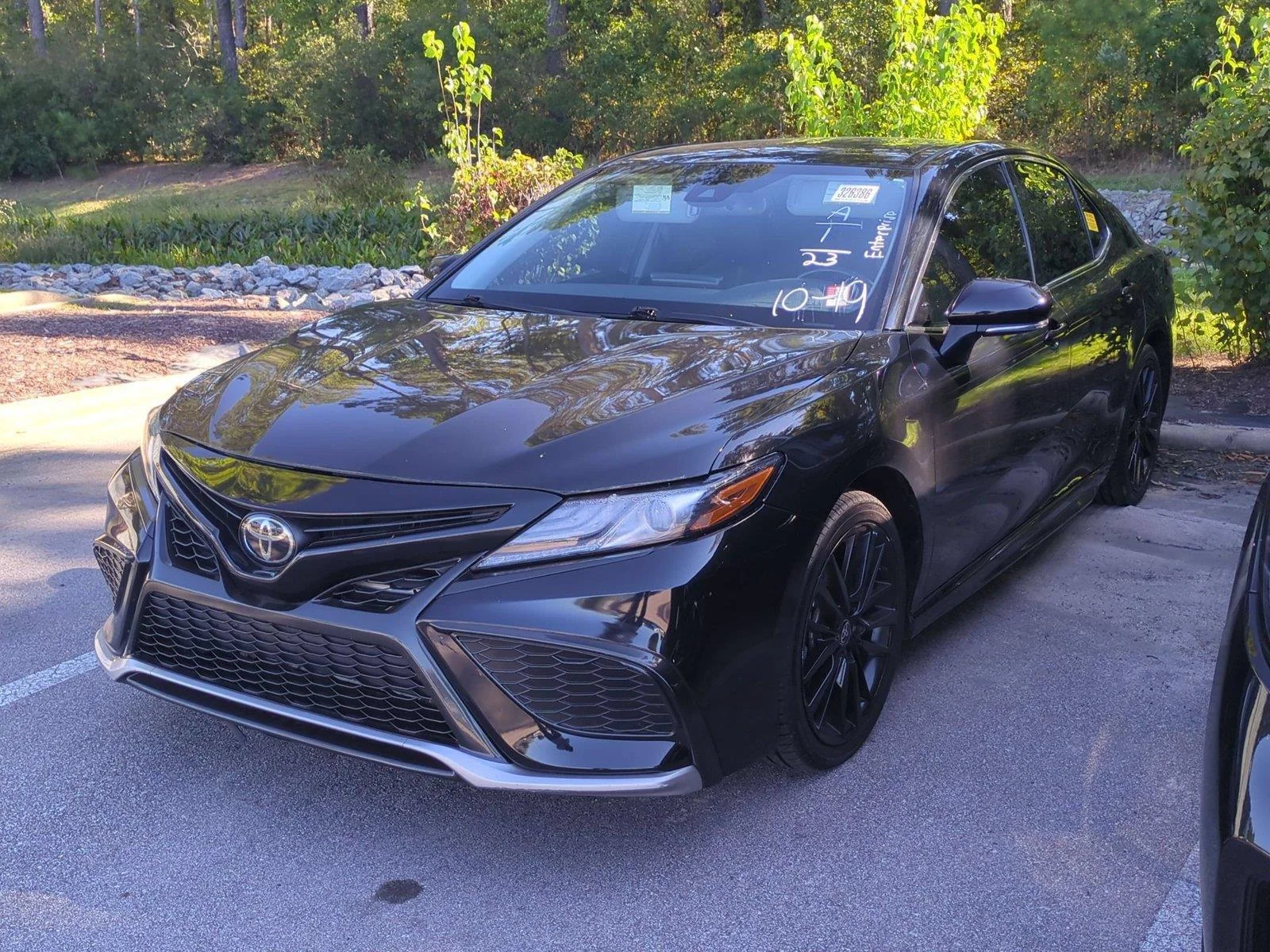 Used 2023 Midnight Black Metallic Toyota XSE image 1