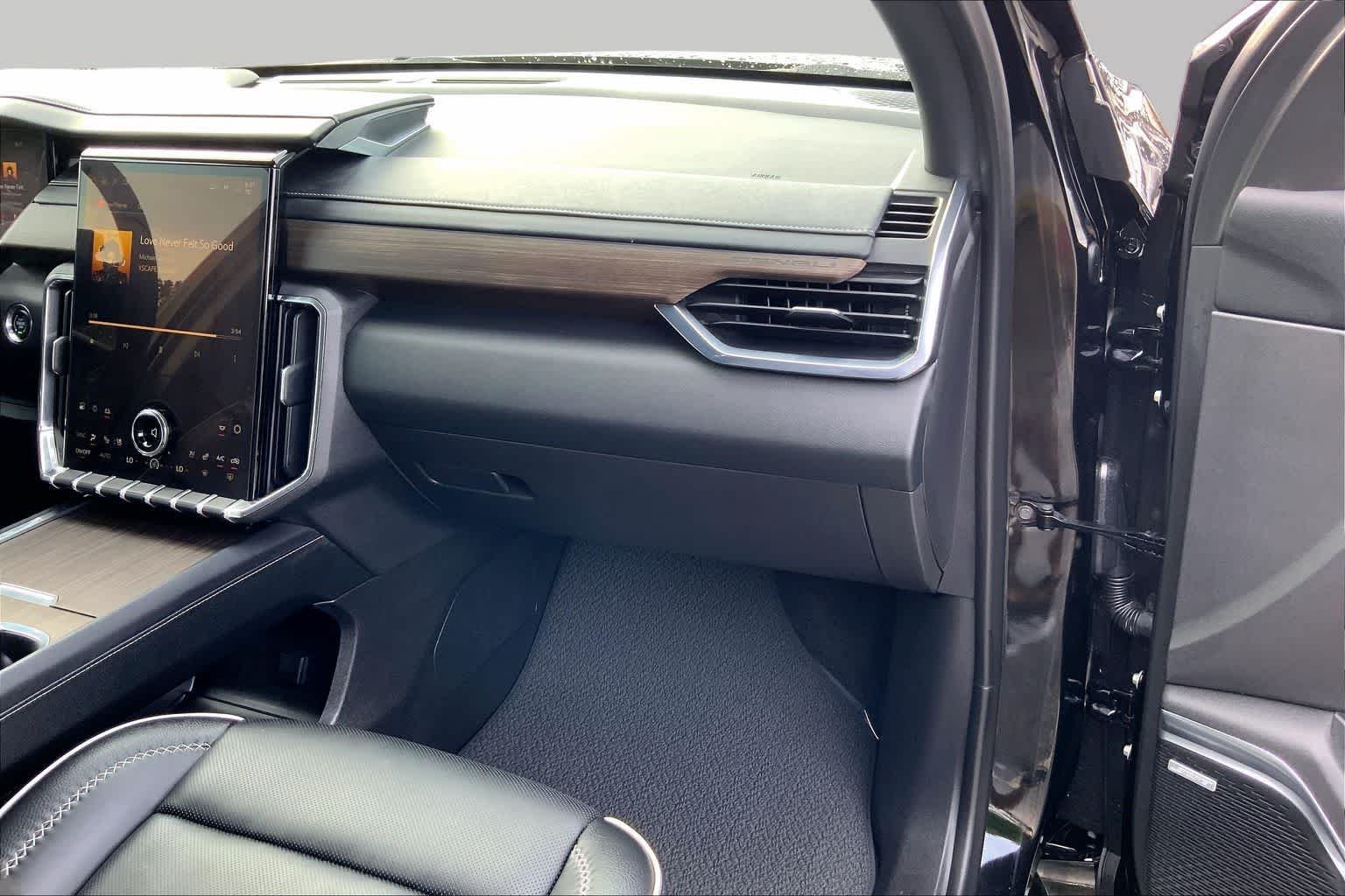 Used 2025 Ebony Twilight Metallic GMC FWD Denali image 18