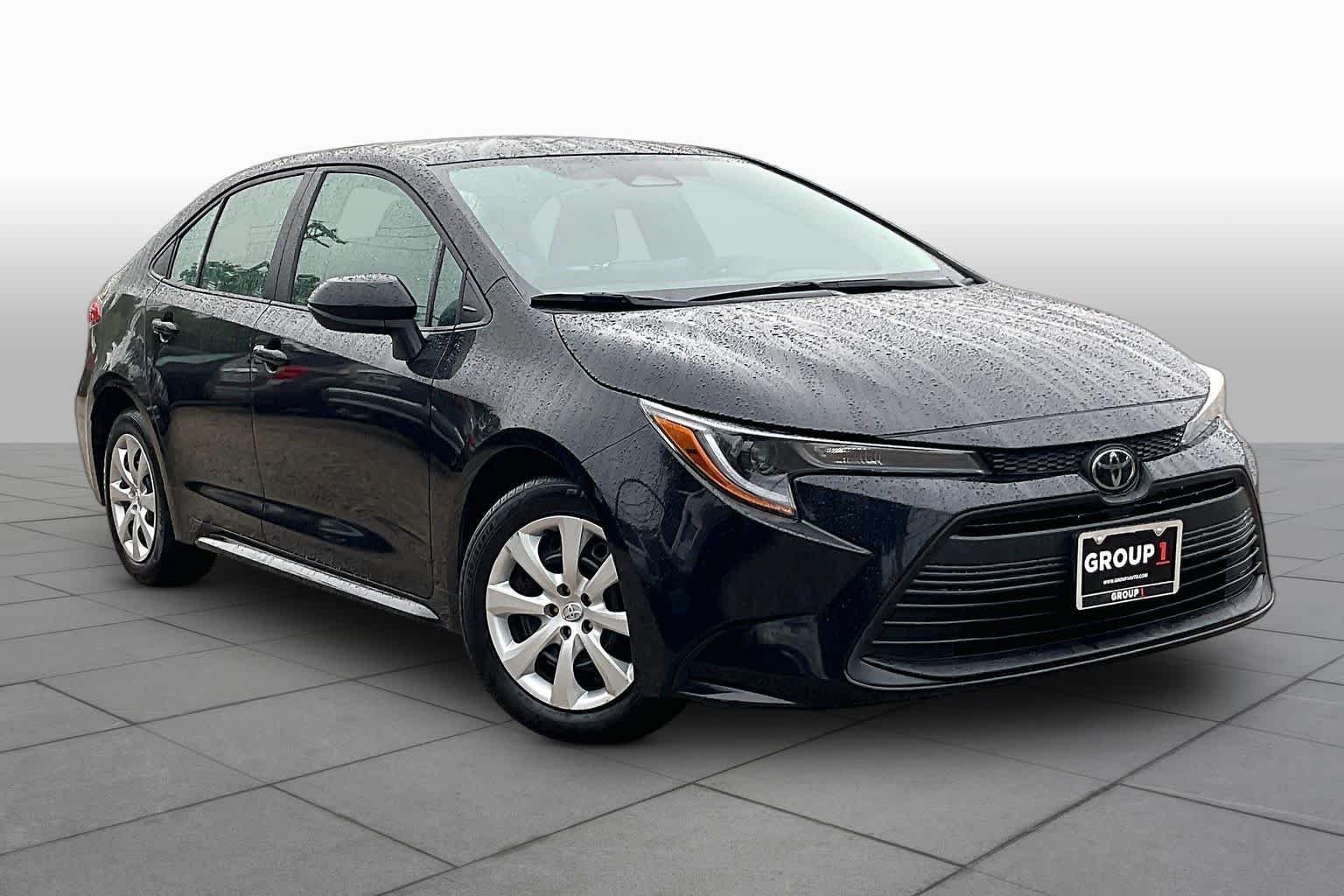 Used 2024 Midnight Black Metallic Toyota LE image 3