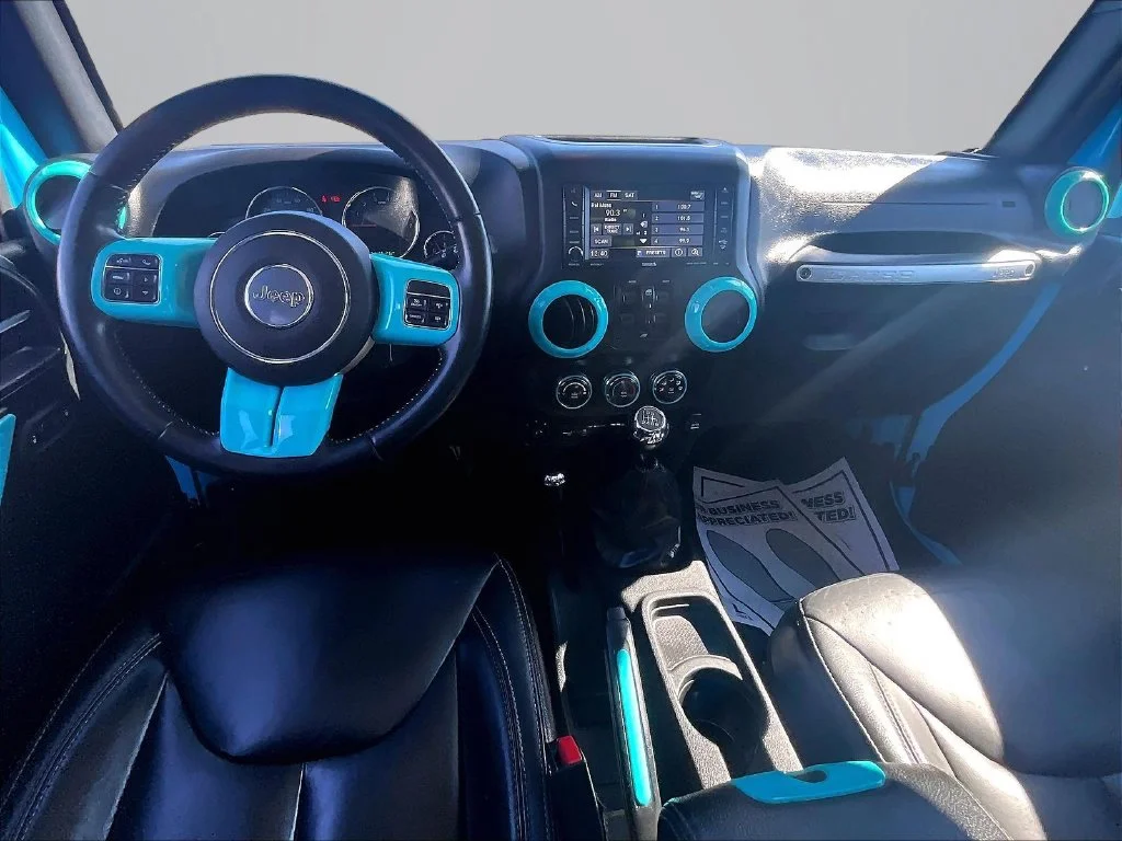 Used 2017 Blue Jeep Unlimited Sahara image 17