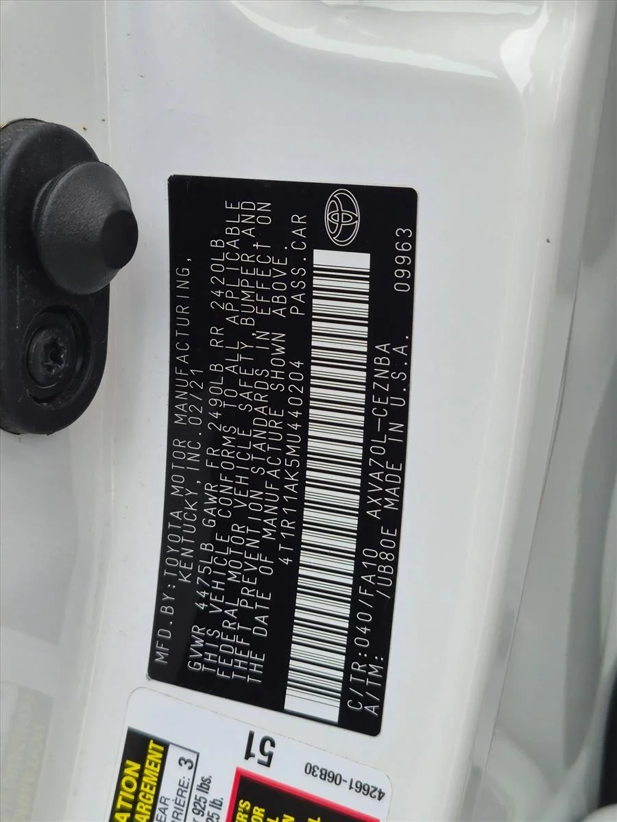Used 2021 Super White Toyota LE image 24
