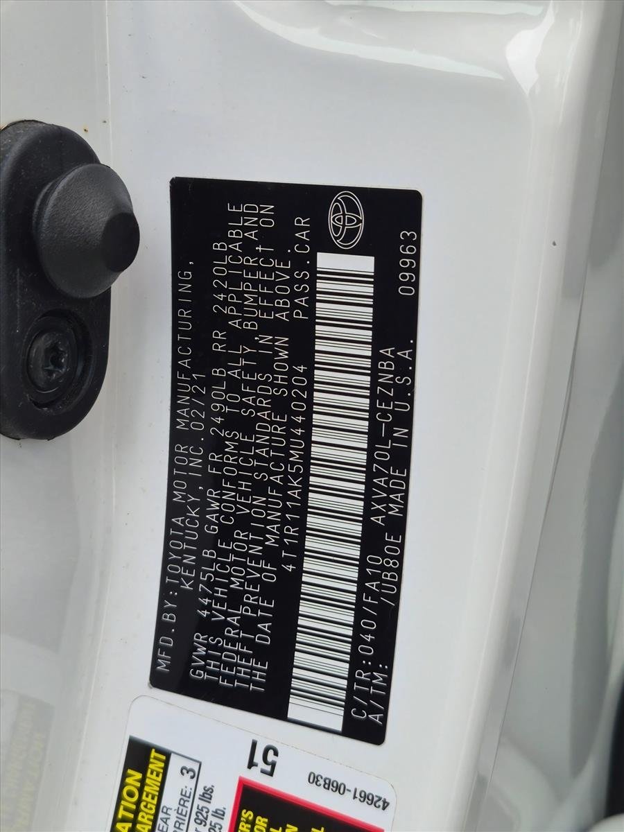 Used 2021 Super White Toyota LE image 24