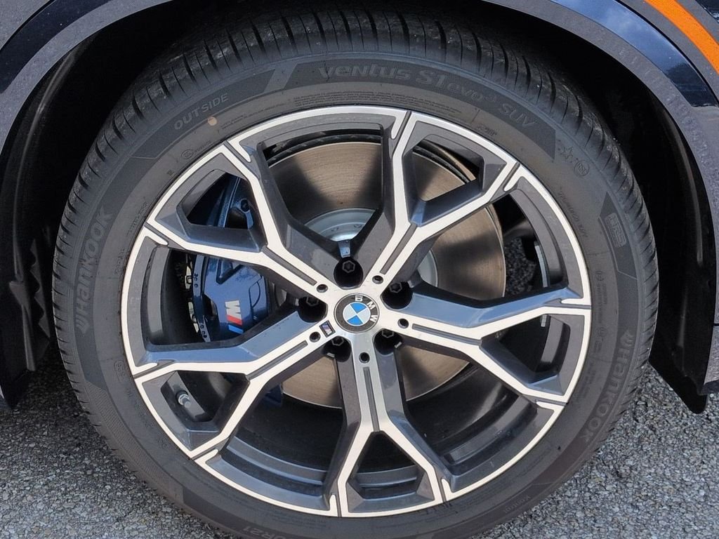 New 2026 Tanzanite Blue II Metallic BMW xDrive50e image 11