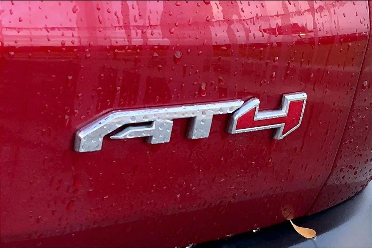Used 2024 Volcanic Red Tintcoat GMC AWD AT4 image 9