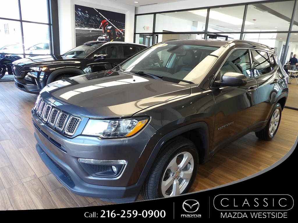 Used 2021 Granite Crystal Metallic Clear Coat Jeep Latitude image 1