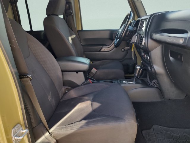 Used 2013 Green Jeep Unlimited Sport image 25