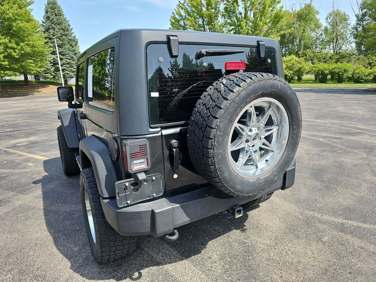 Used 2017 Black Clearcoat Jeep Sport image 3
