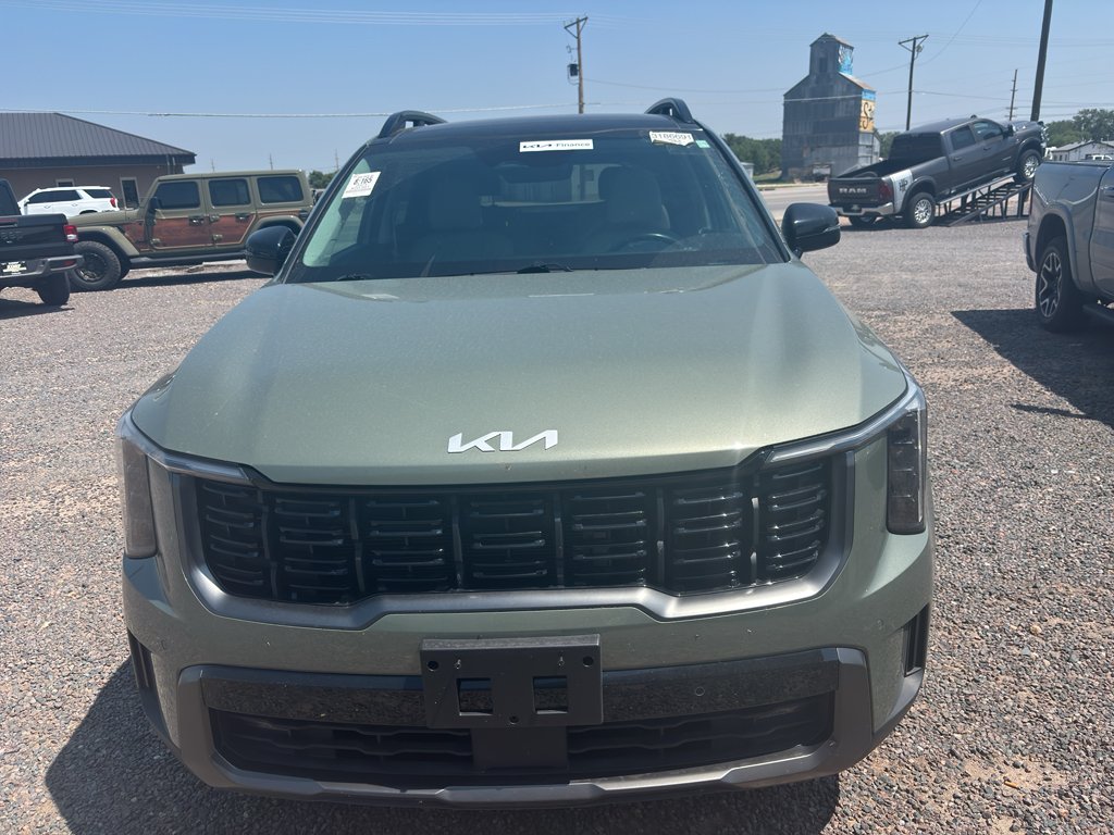 Used 2024 Jungle Green Kia X-Line EX image 1