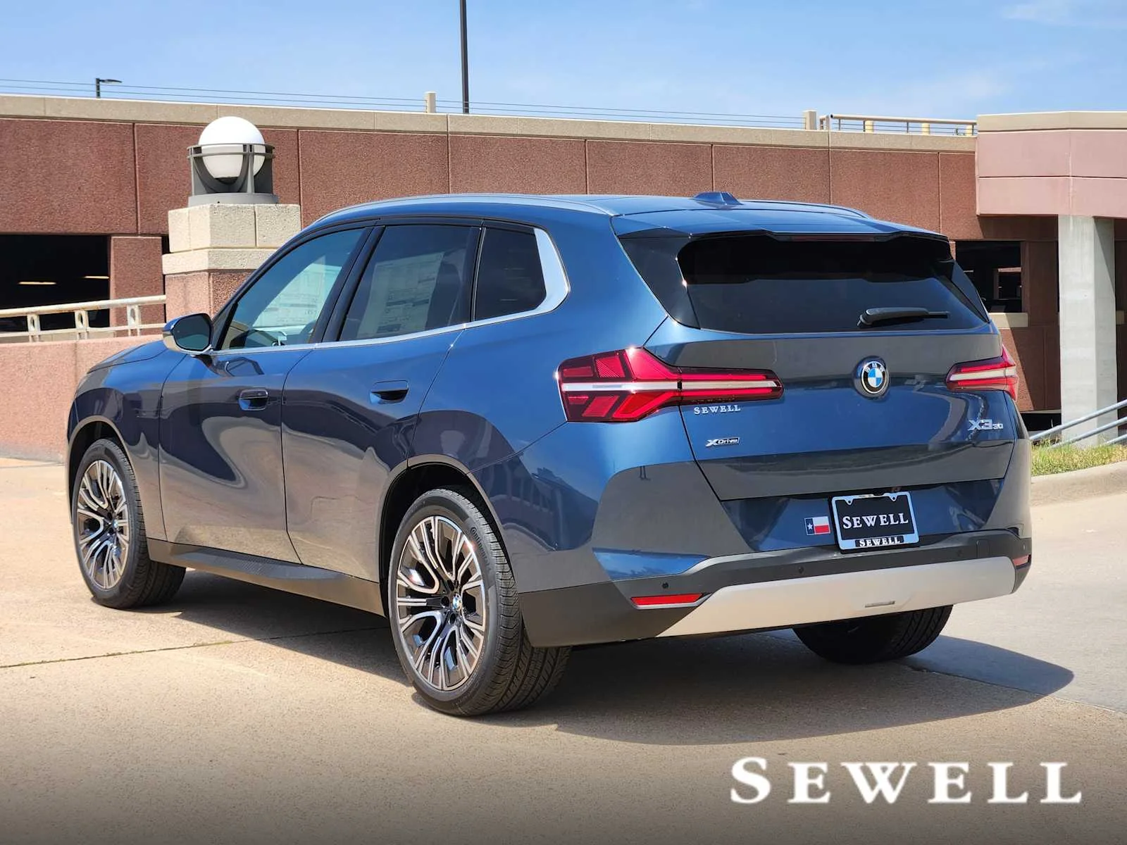 New 2026 Arctic Race Blue metallic BMW 30 xDrive image 3