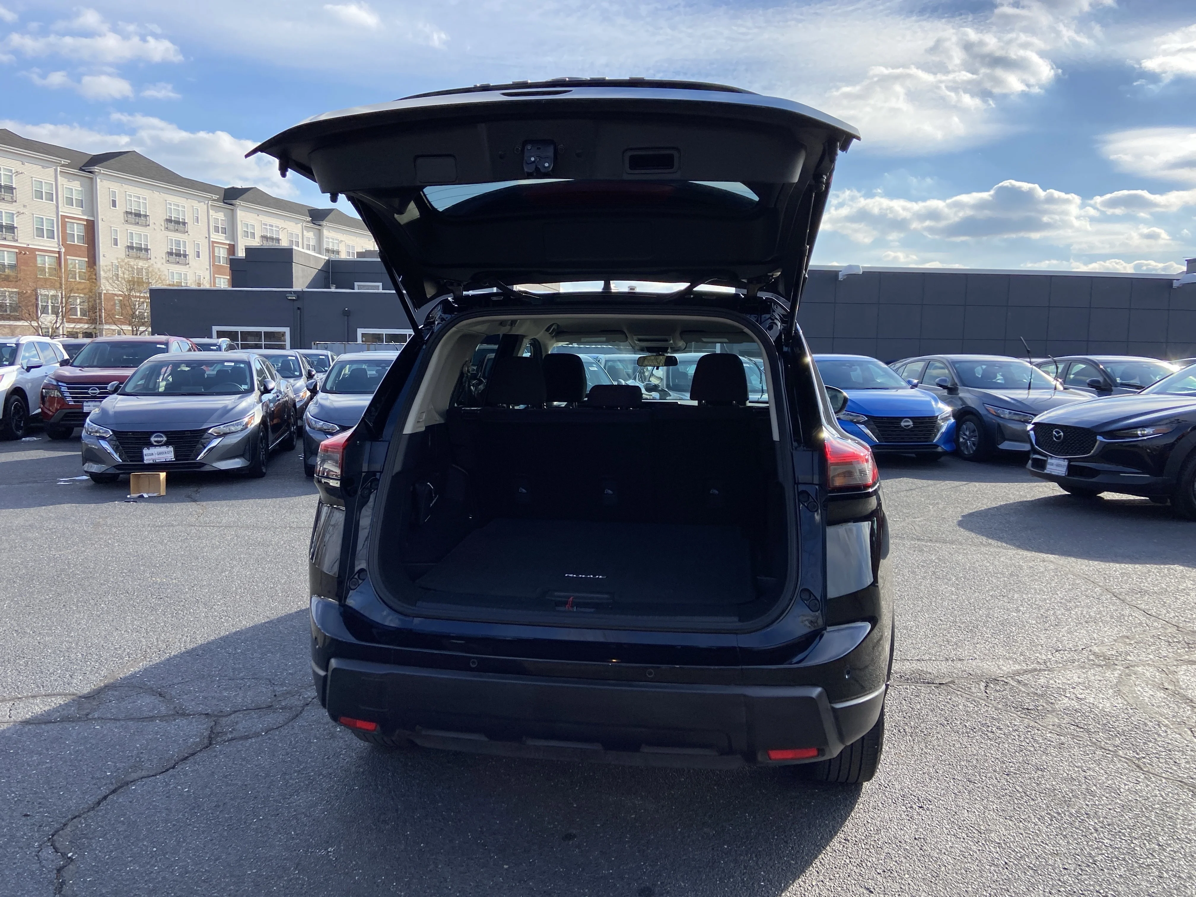 Certified Used 2025 Super Black Nissan S image 28