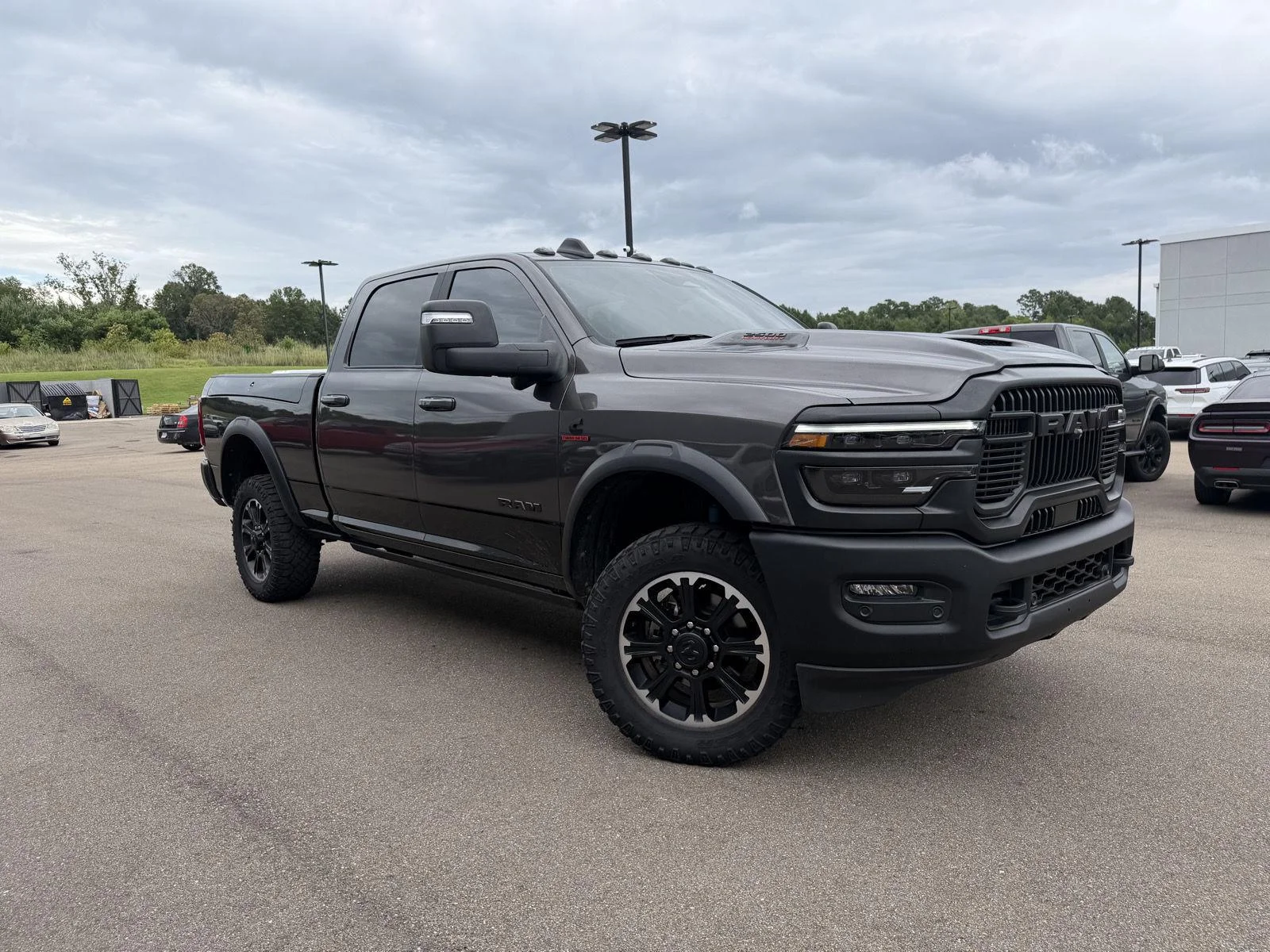 Used 2025 Granite Crystal Metallic Clearcoat Ram Rebel image 3