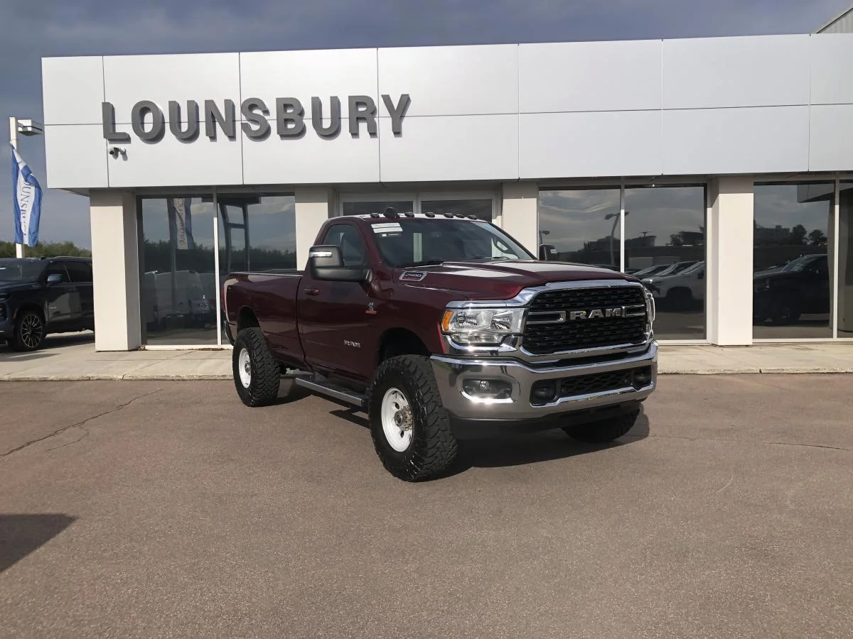 Used 2024 Silver RAM Big Horn 4x4 Reg Cab 8
