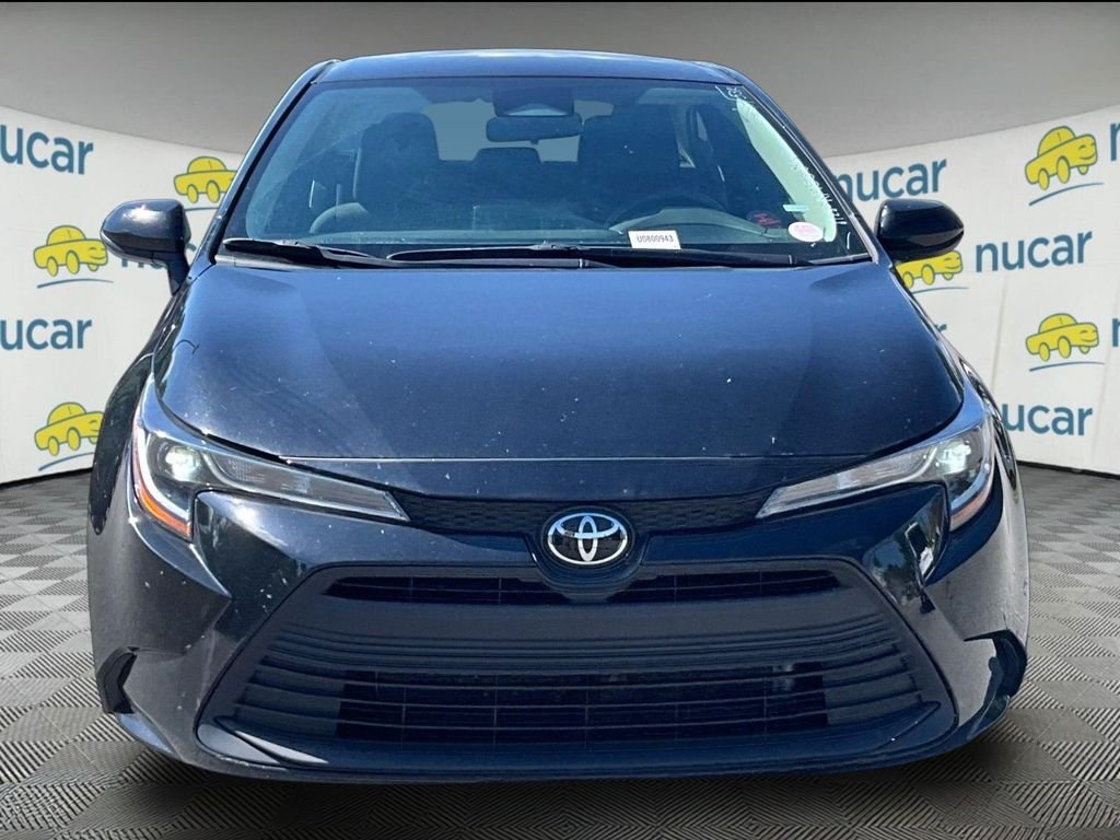 Used 2024 Black Toyota LE image 2