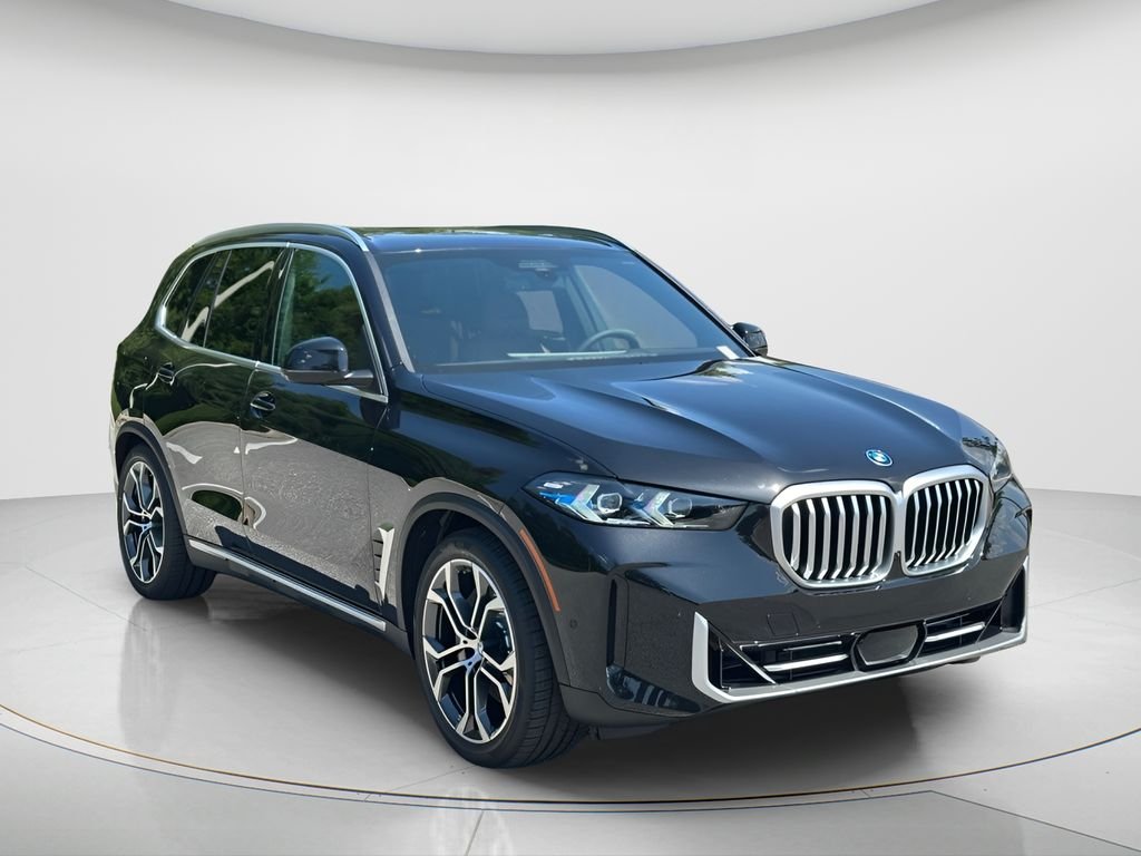 New 2026 Black Sapphire Metallic BMW xDrive50e image 3