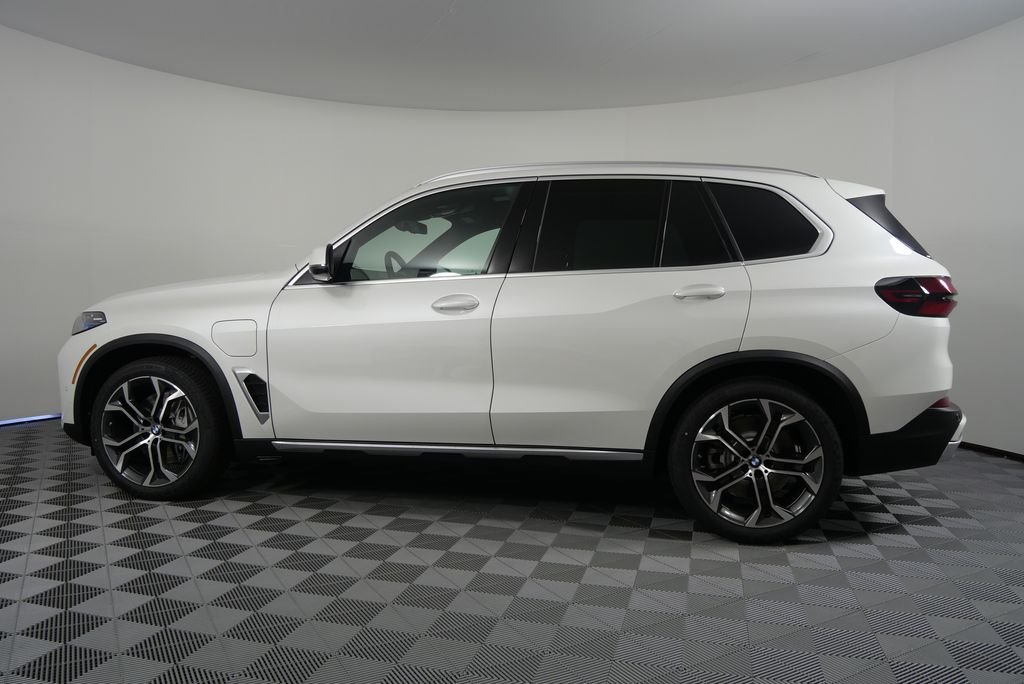 Used 2026 Mineral White Metallic BMW xDrive50e image 3