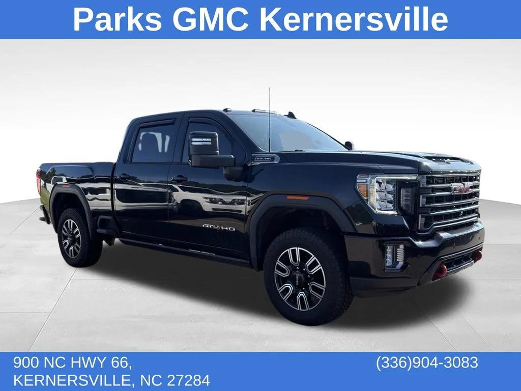 Used 2022 ONYX BLACK GMC AT4 image 1