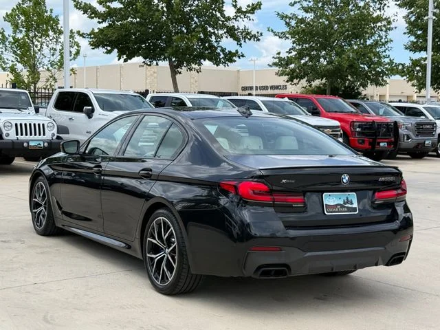 Used 2023 Black BMW M550i xDrive image 7