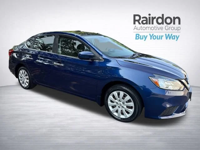 Used 2017 Deep Blue Pearl Nissan SV image 1