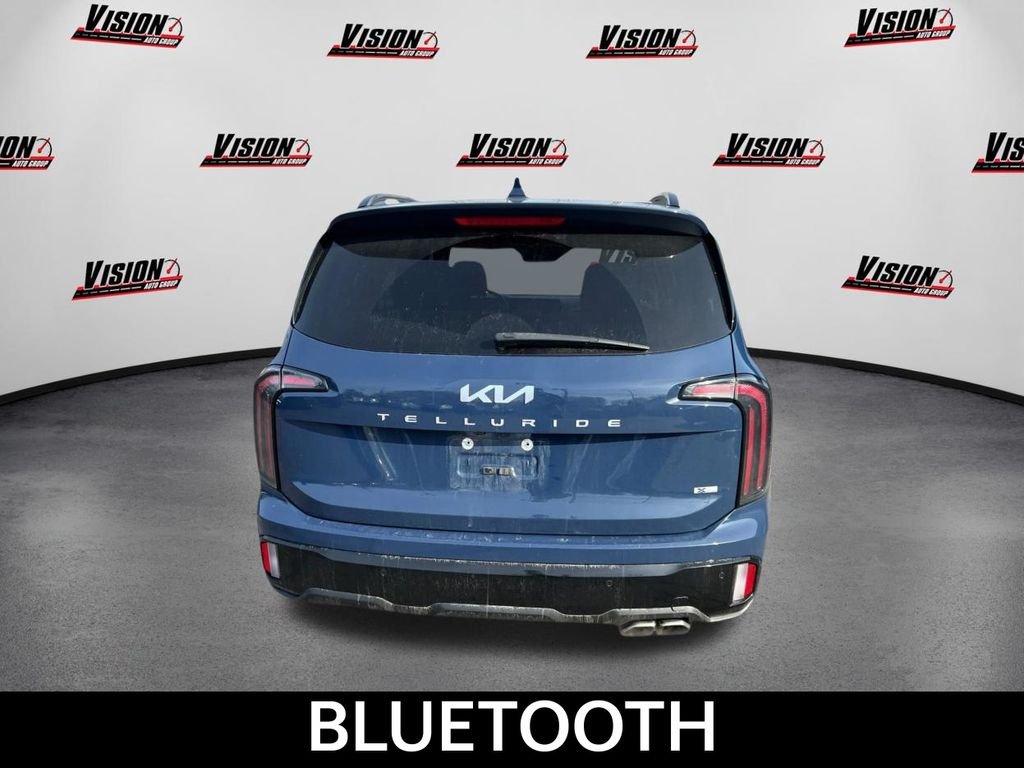 Used 2024 Black Kia EX X-Line image 8