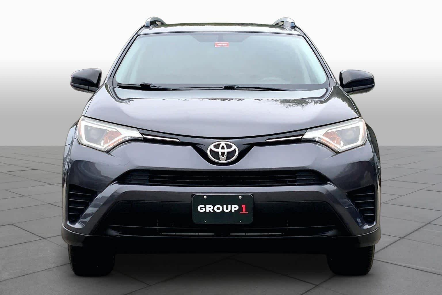 Used 2016 Magnetic Gray Metallic Toyota LE image 4