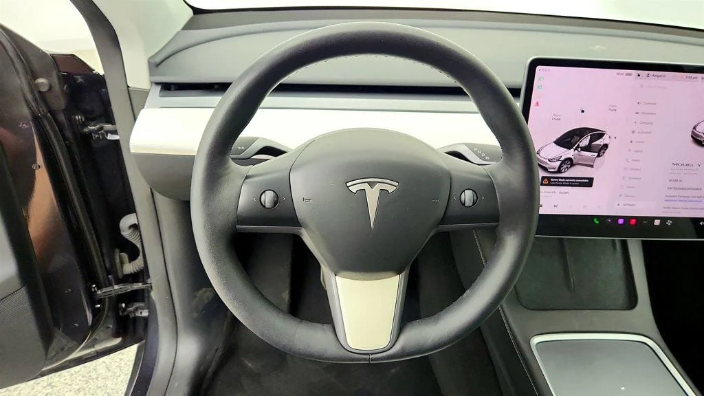Used 2024 Stealth Grey Tesla Long Range AWD w/ 7-Seat White & Black Premium Interior image 13