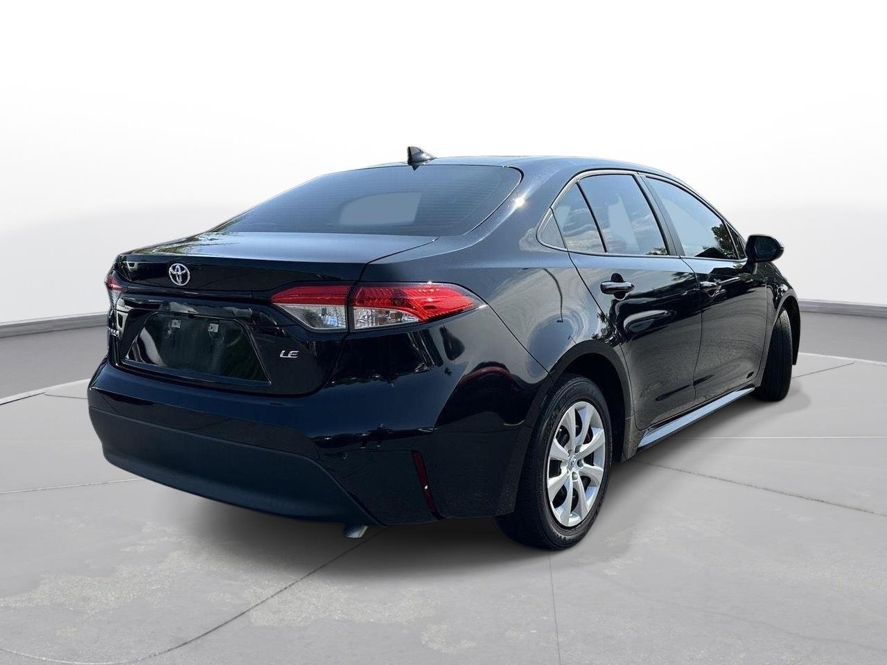 Used 2024 Midnight Black Metallic Toyota LE image 6