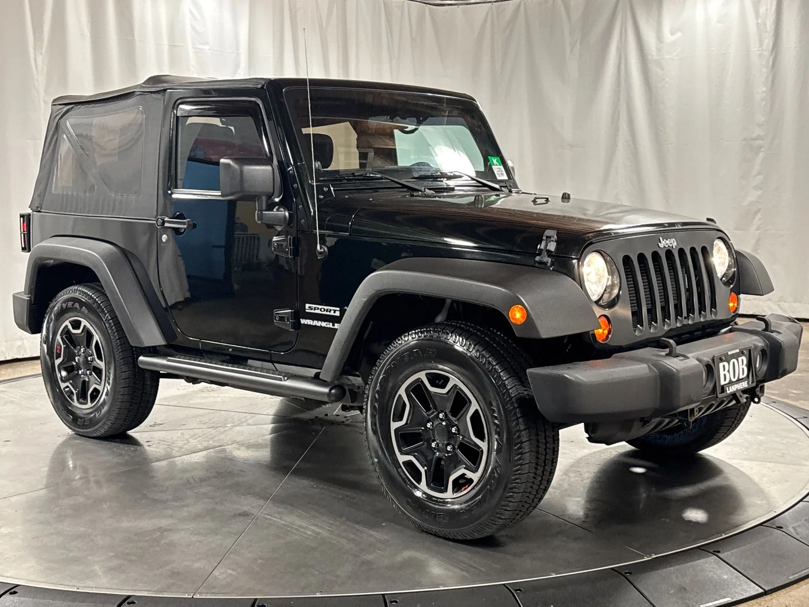 Used 2012 Black / Forest Green Jeep Sport image 7