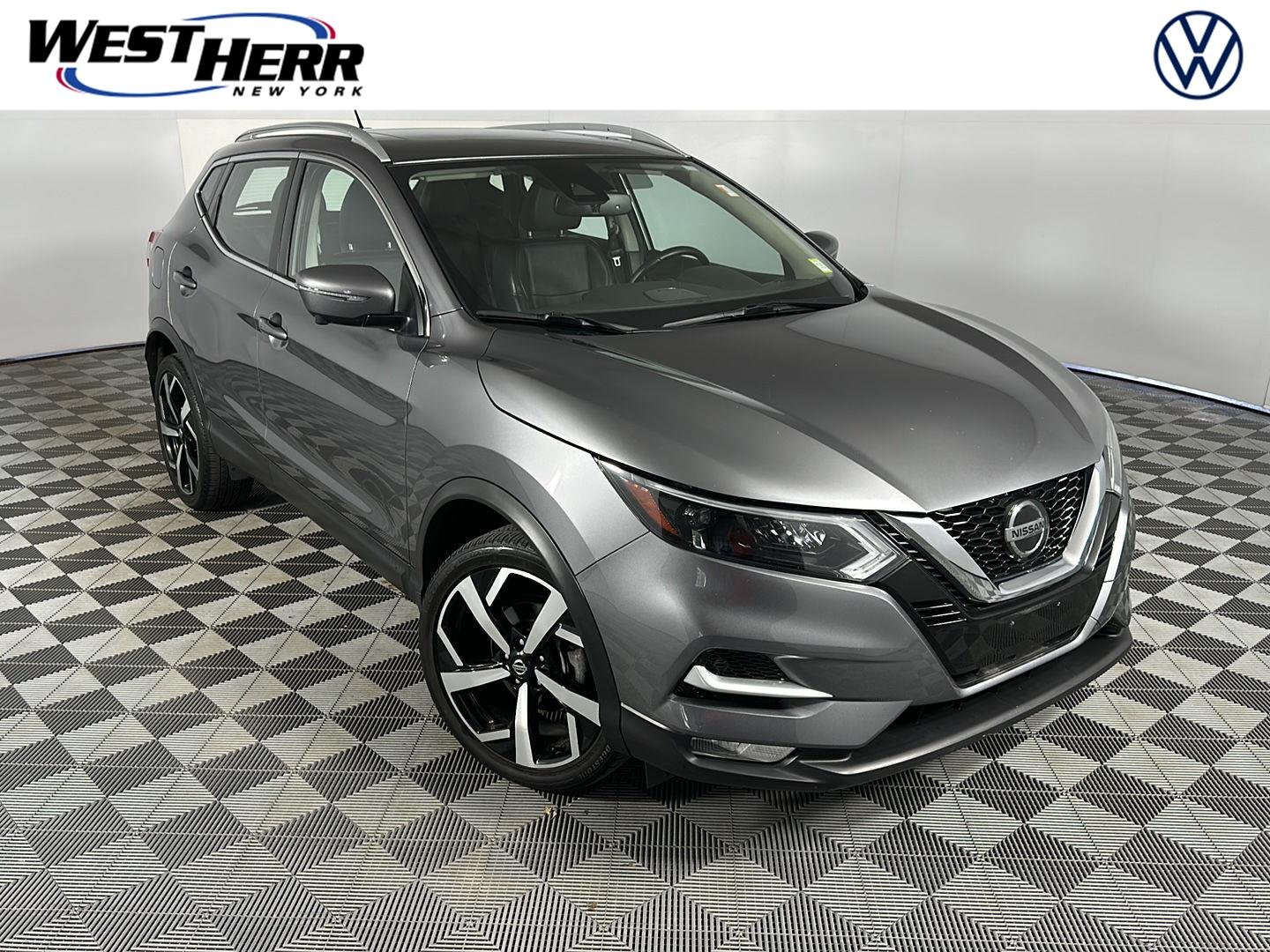 Used 2022 Gun Metallic Nissan SL image 1