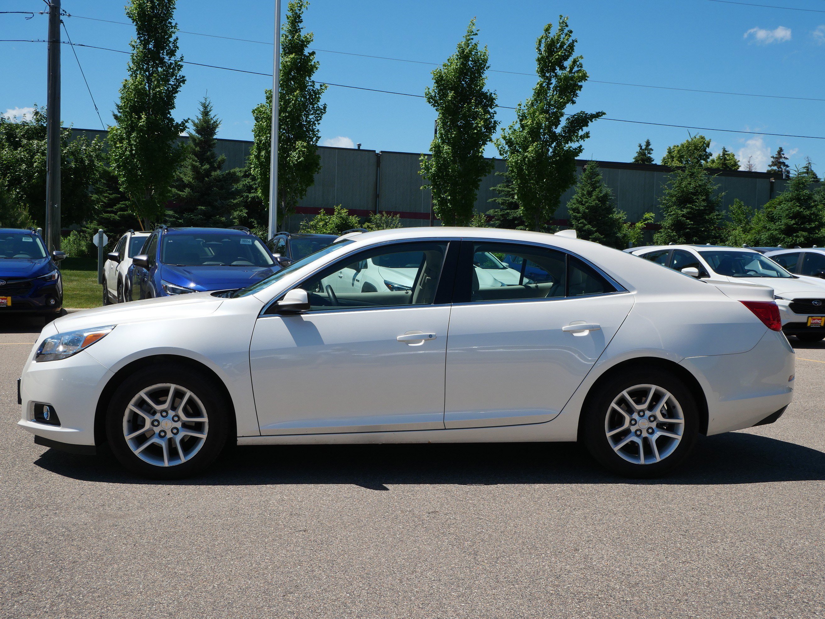 Used 2013 White Diamond Tricoat Chevrolet ECO image 4