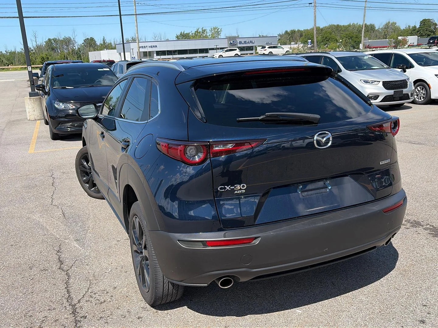 Used 2024 Deep Crystal Blue Mica Mazda 2.5 S Select Sport image 3
