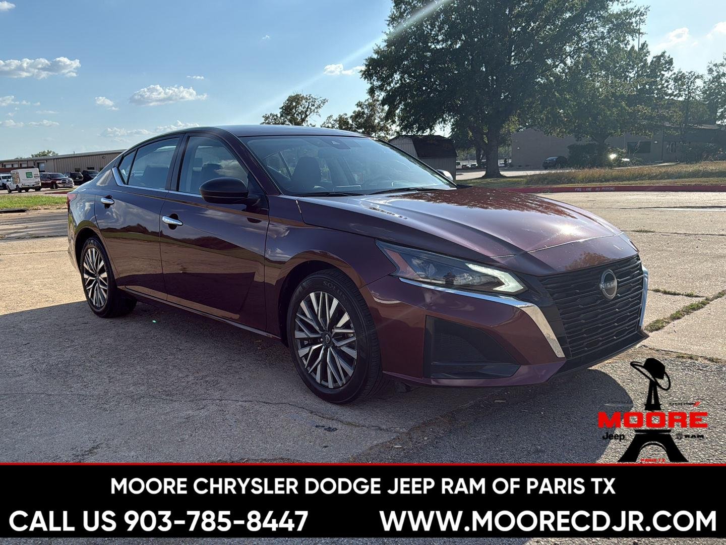 Used 2025 Garnet Pearl Metallic Nissan SV image 1