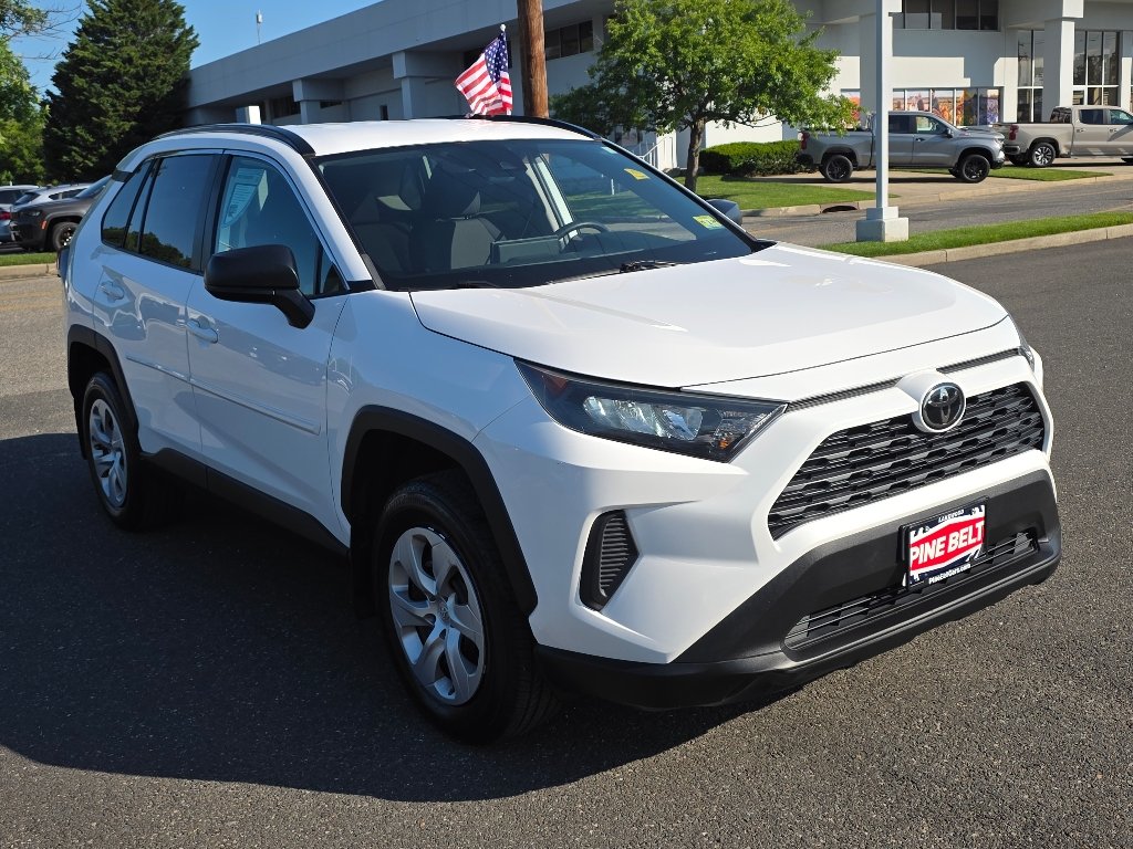 Used 2021 Super White Toyota LE image 8