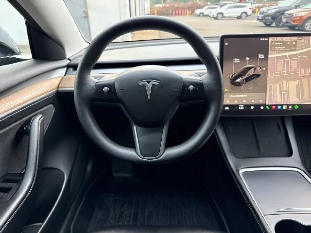 Used 2023 Solid Black Tesla Base image 18