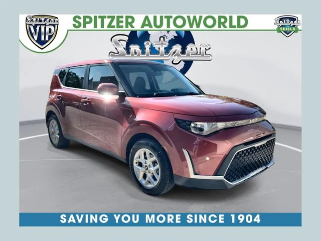 Used 2023 Orange Kia LX image 1