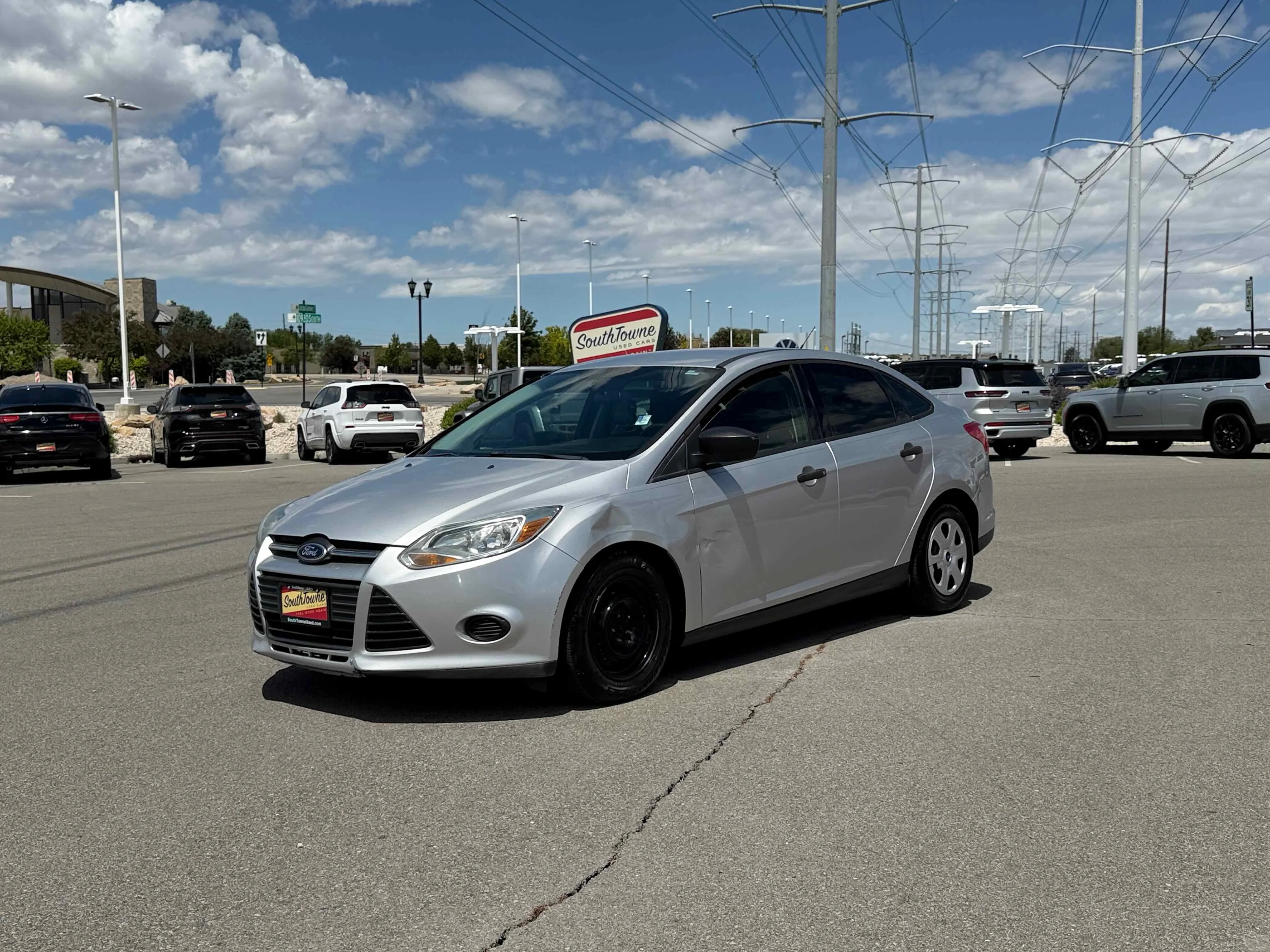 Used 2013 Ingot Silver Ford S image 1
