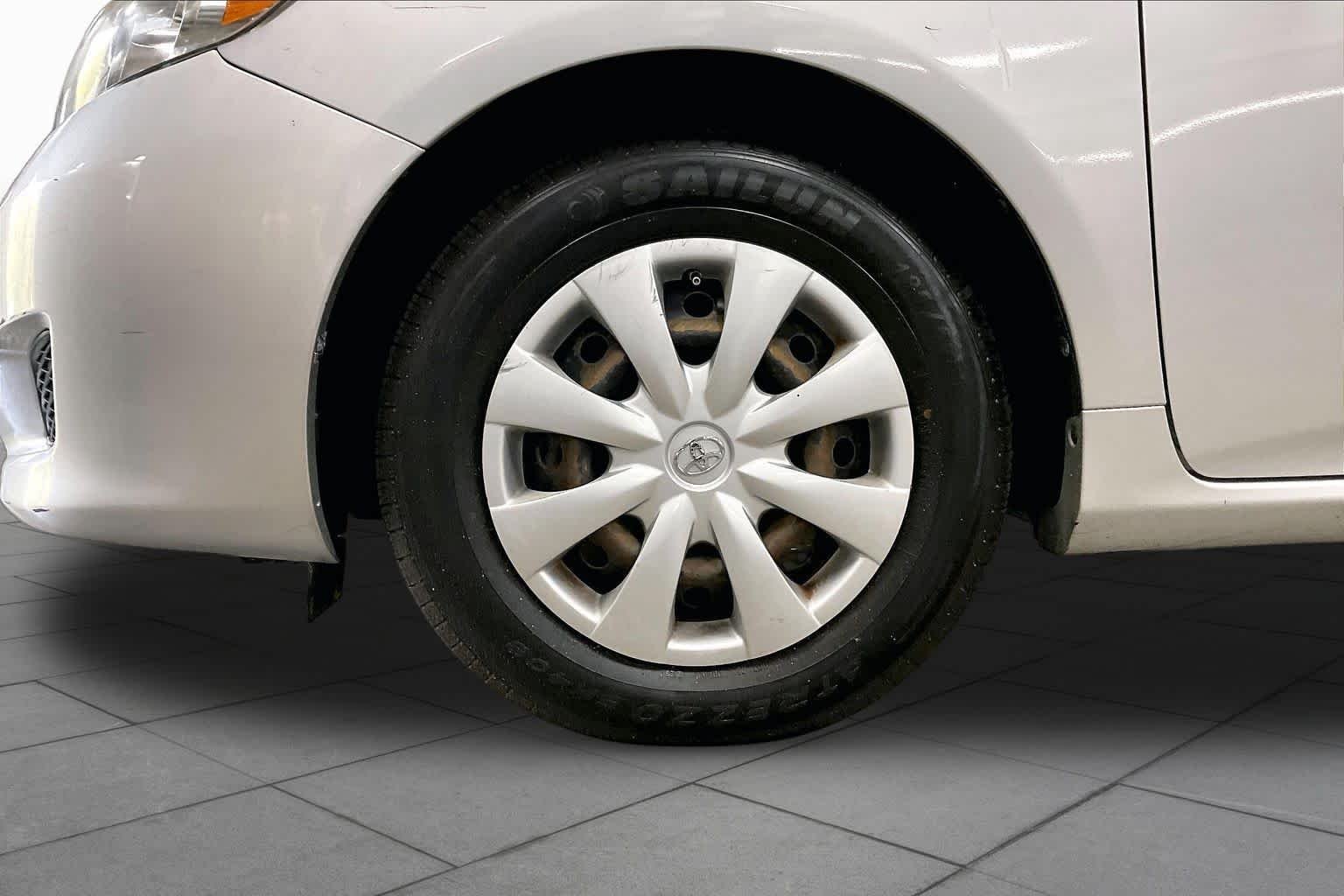 Used 2010 Classic Silver Metallic Toyota LE image 10