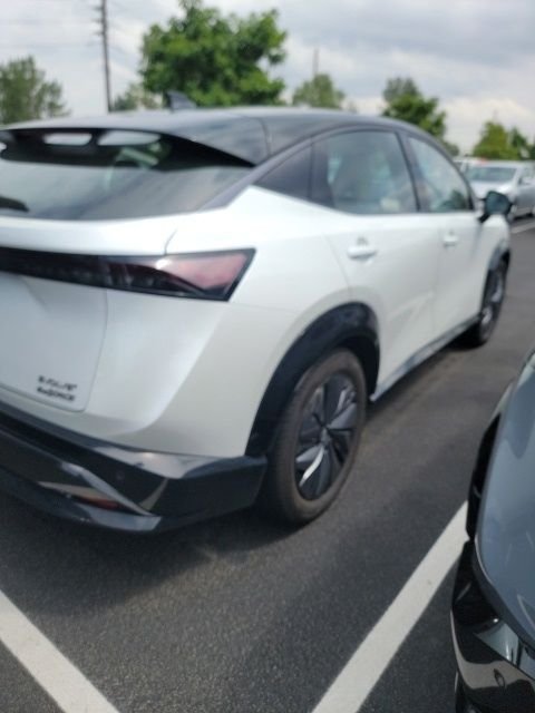 Used 2024 White Nissan EVOLVE+ e-4ORCE image 6