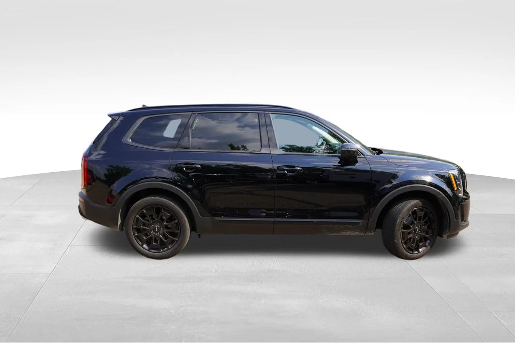 Used 2022 Ebony Black Kia EX image 2