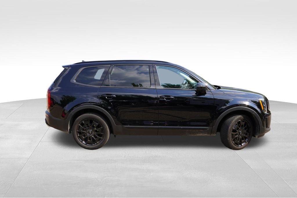 Used 2022 Ebony Black Kia EX image 2