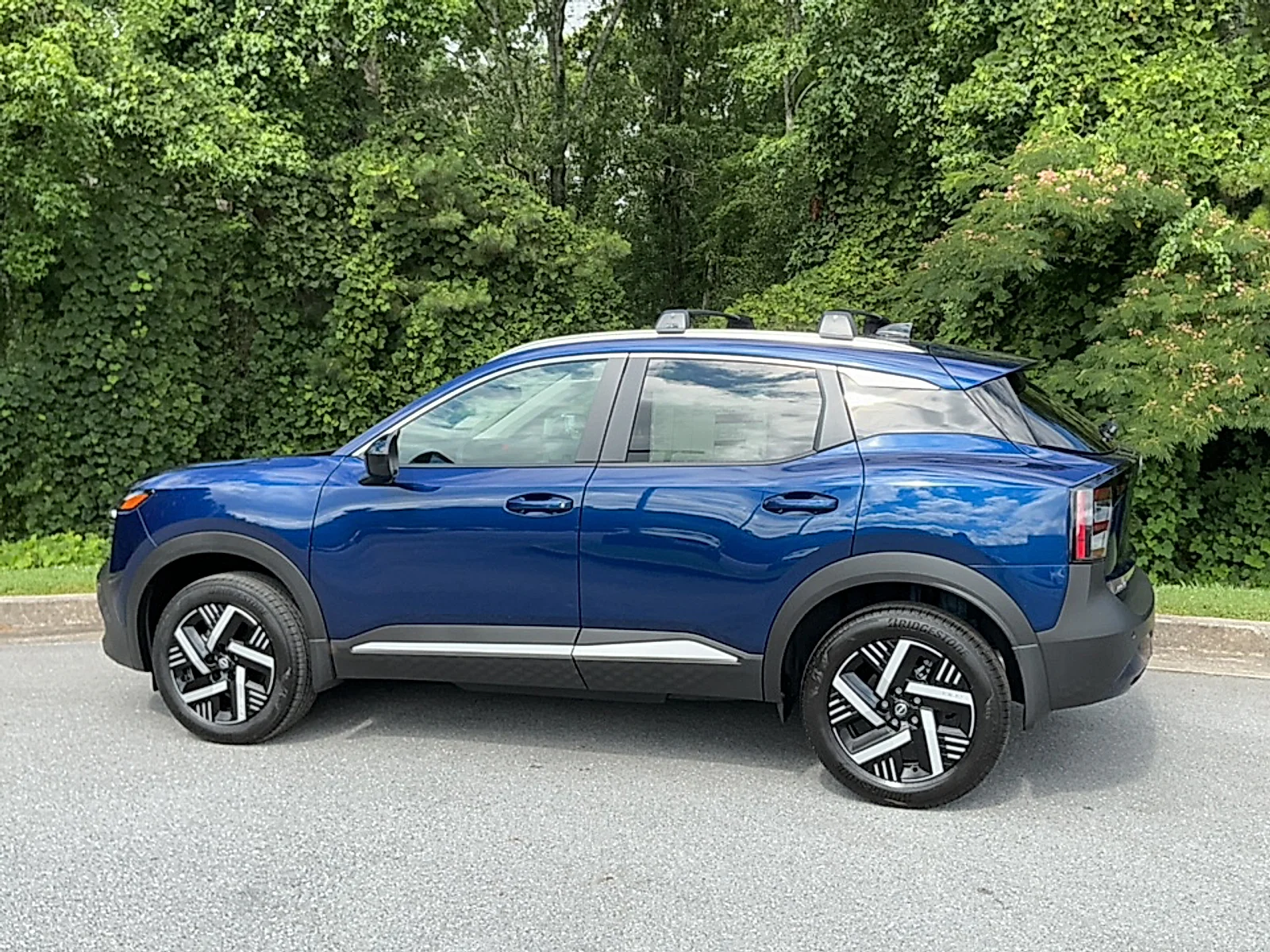 New 2026 Deep Blue Pearl Nissan SV image 3