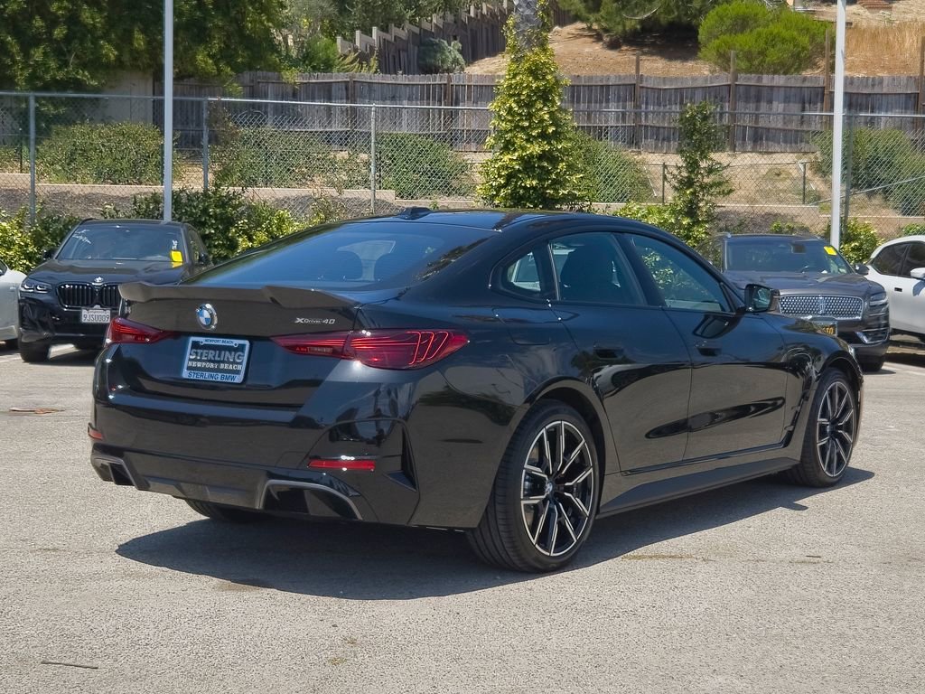 New 2026 Black Sapphire Metallic BMW xDrive40 image 18