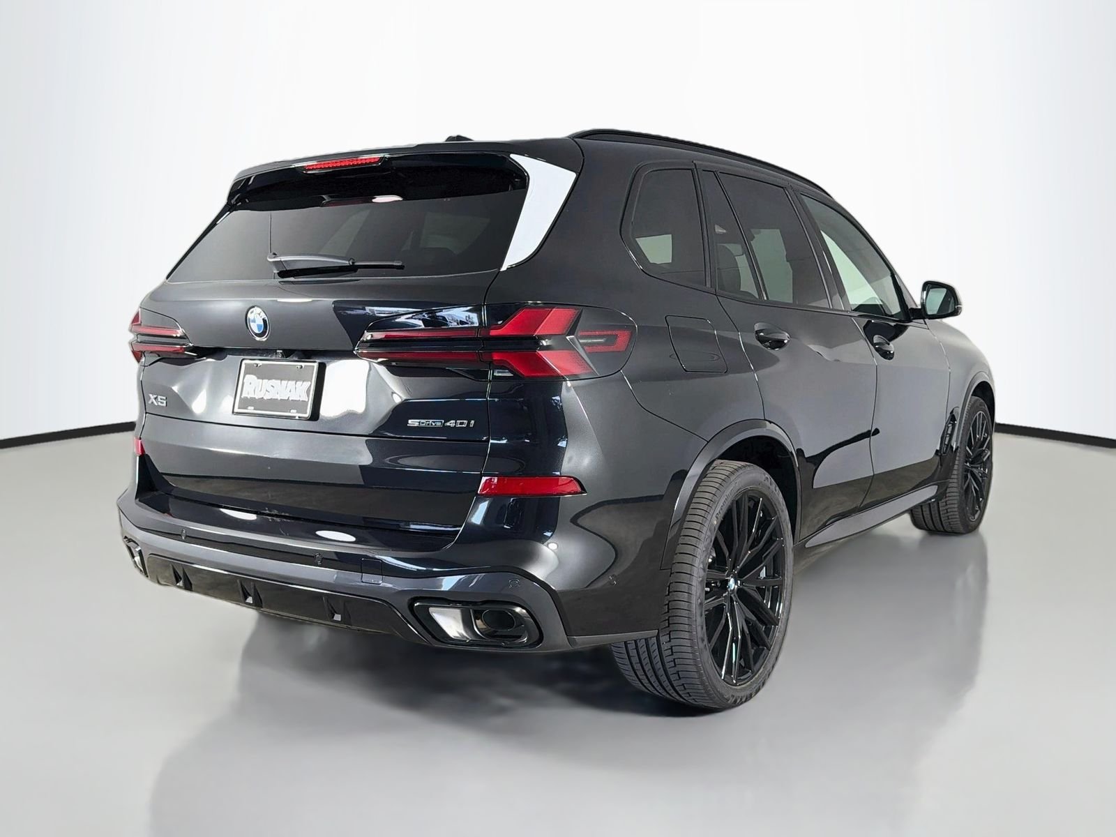 New 2026 Black Sapphire Metallic BMW sDrive40i image 7