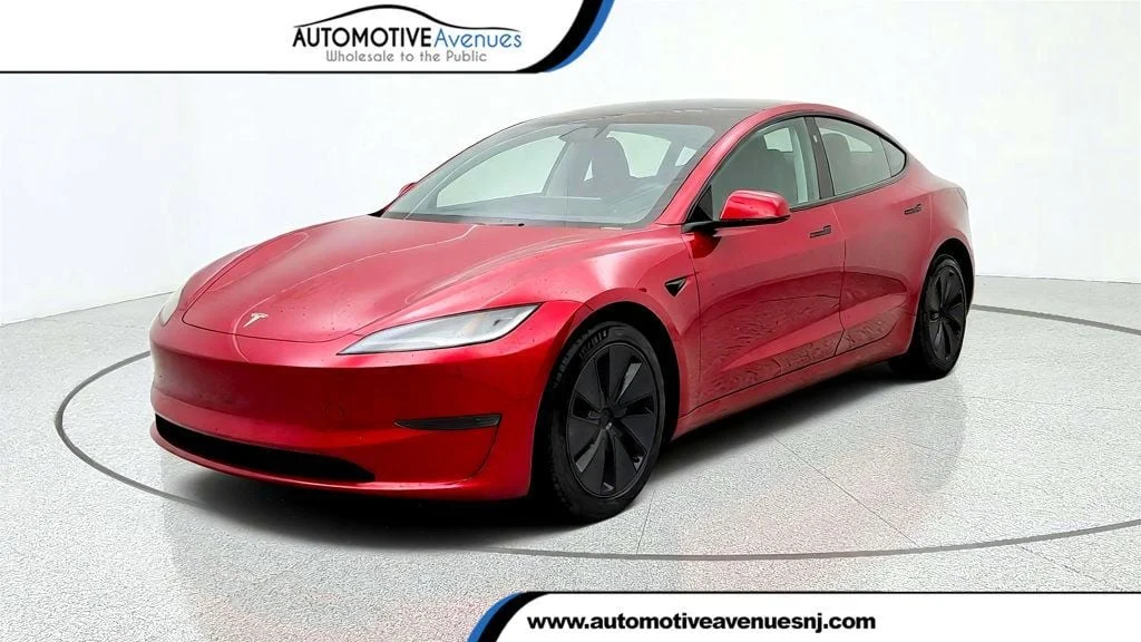 Used 2024 Ultra Red Tesla Long Range AWD image 1